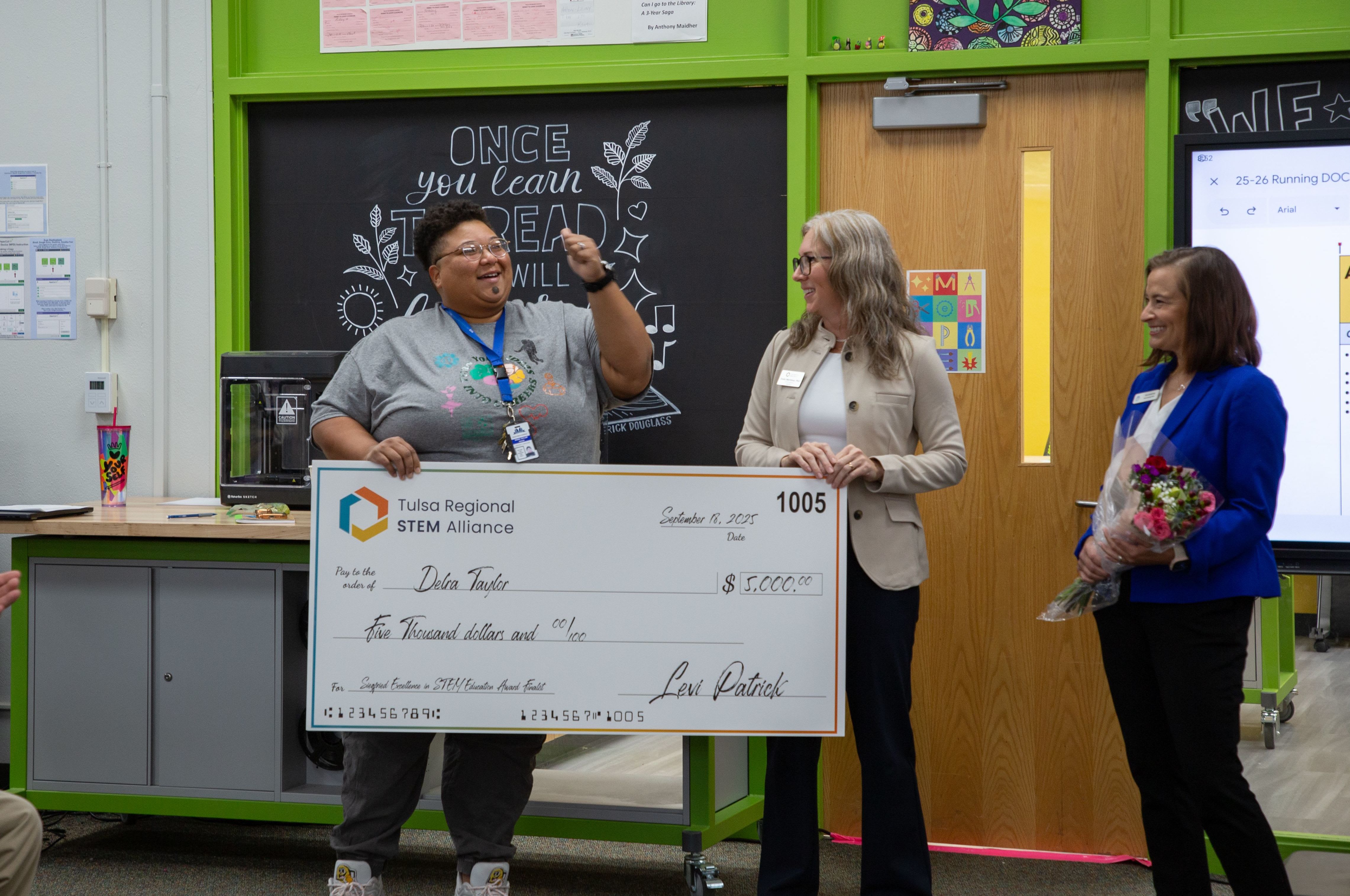 a student smiles in class